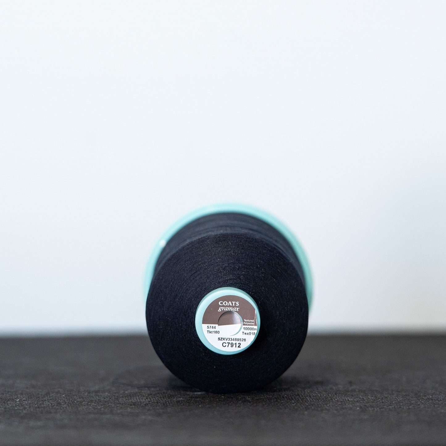 polyester continuous filament textured thread for alterations and overlocking