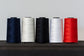 Coats astra polyester threads in black, blue, white, natural and red for sewing
